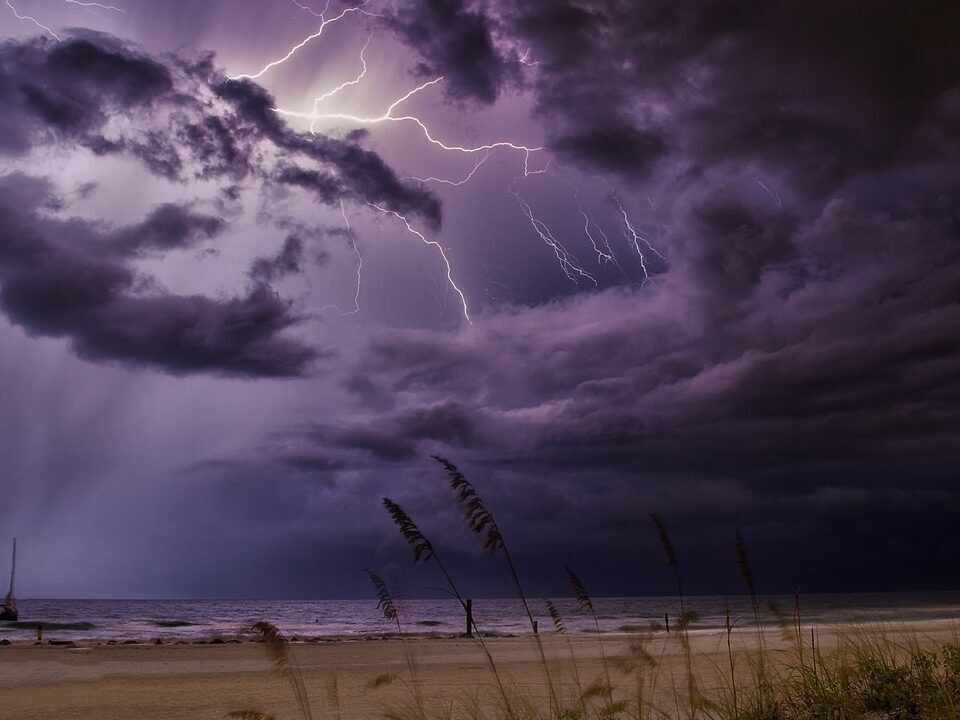 Stormy skies with lightening flashes.